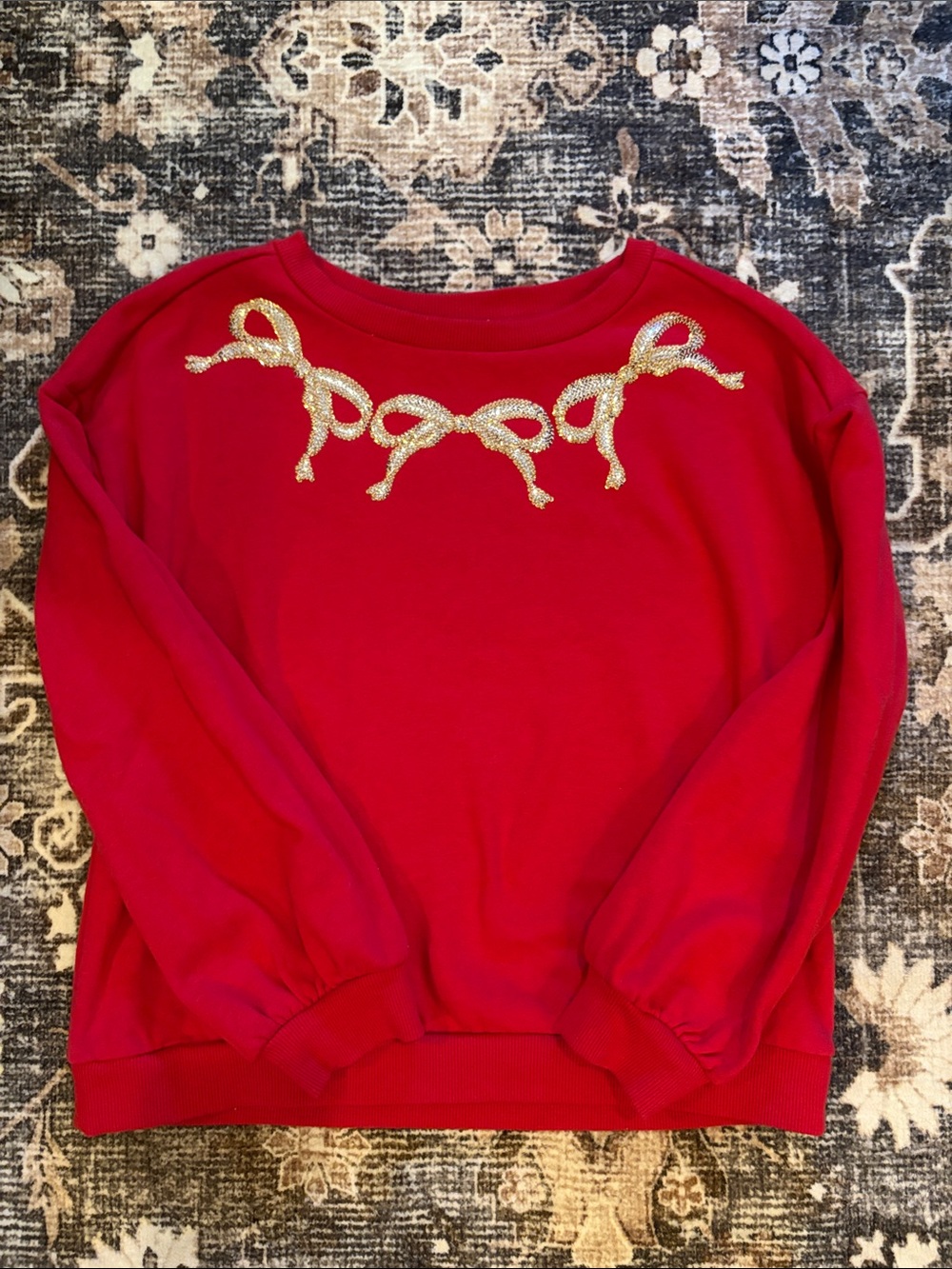 Red Sweater with Gold Bow Embellishments